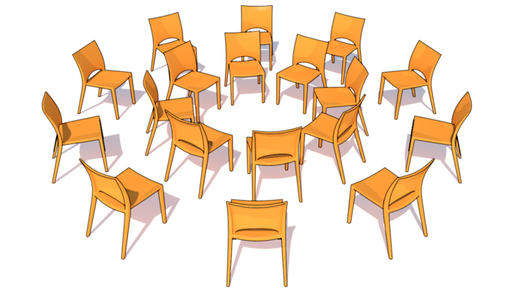 Kuvassa on kaksi kehää piirissä tuoleja